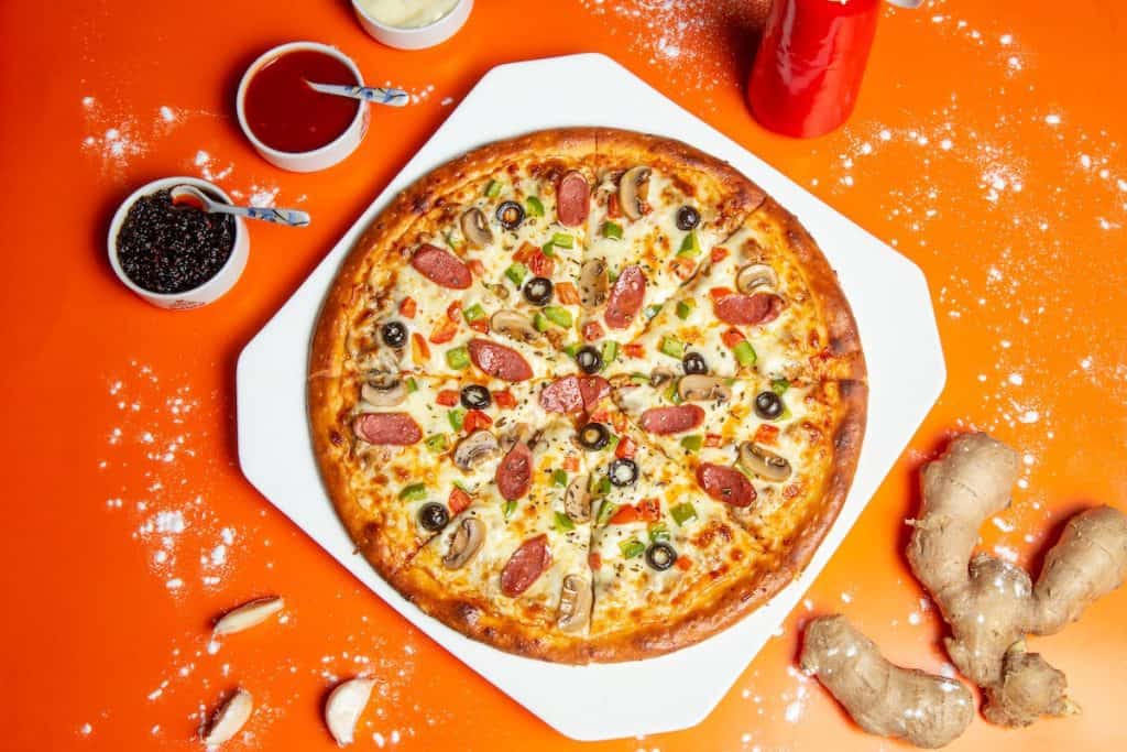 pizza on orange table