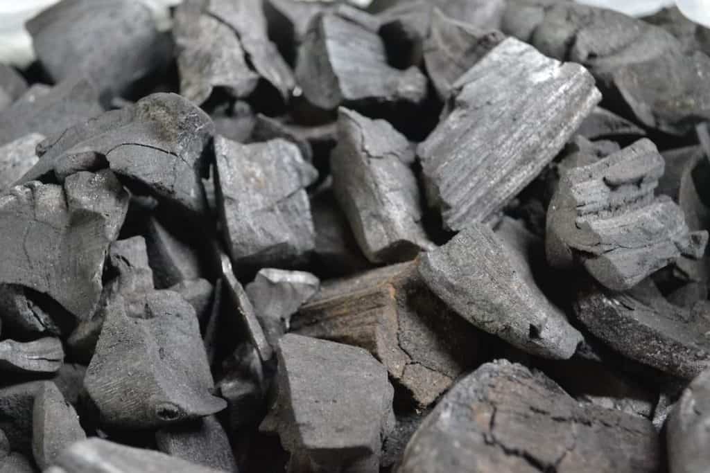 lump charcoal in pile